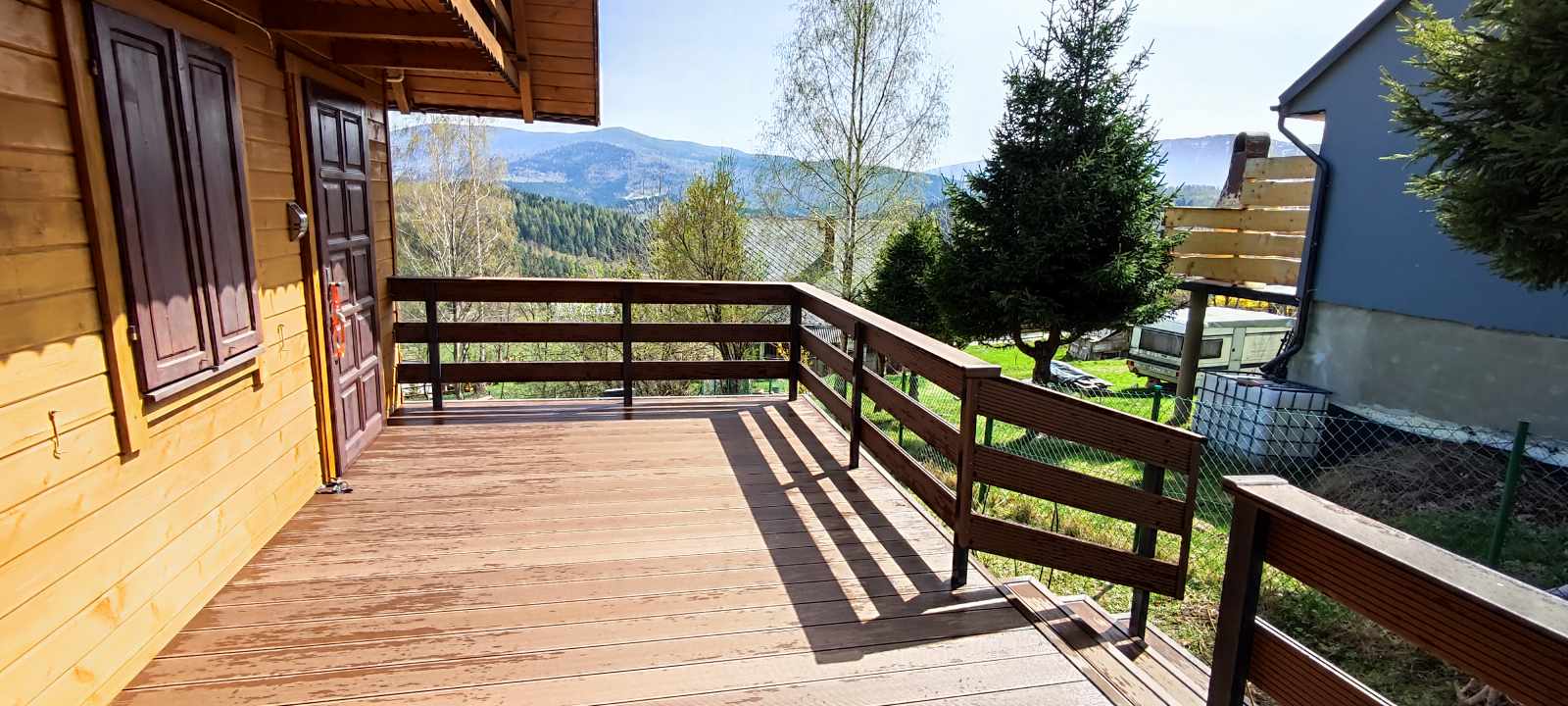 Decking with steps leading to the garden